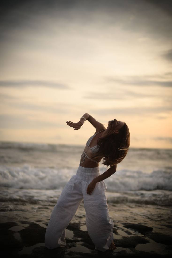 Pip dancing on the shore at dusk