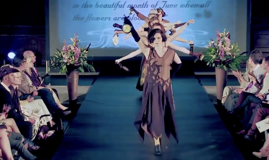 Dancers moving as one down a fashion show catwalk