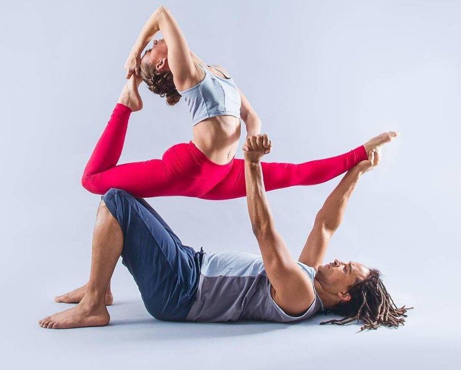 Pip and her partner in an acroyoga pose
