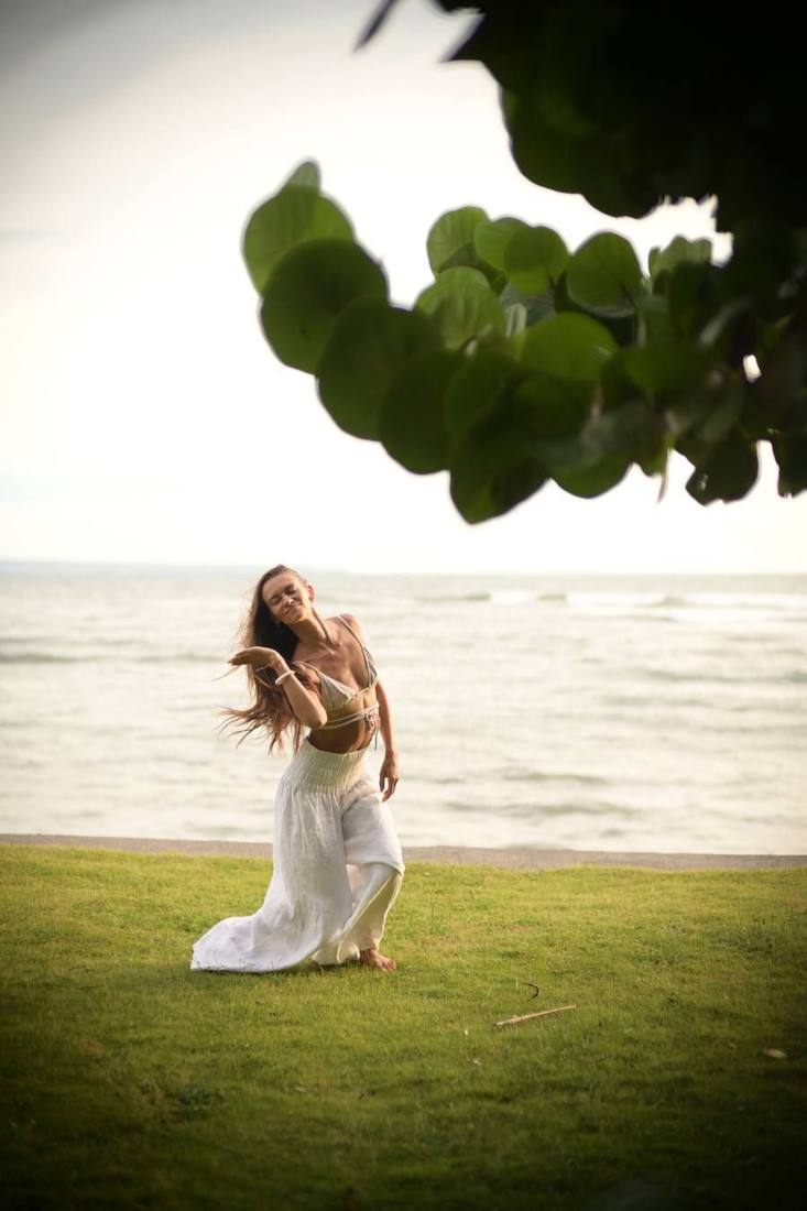 Pip dancing on the lawn by the ocean