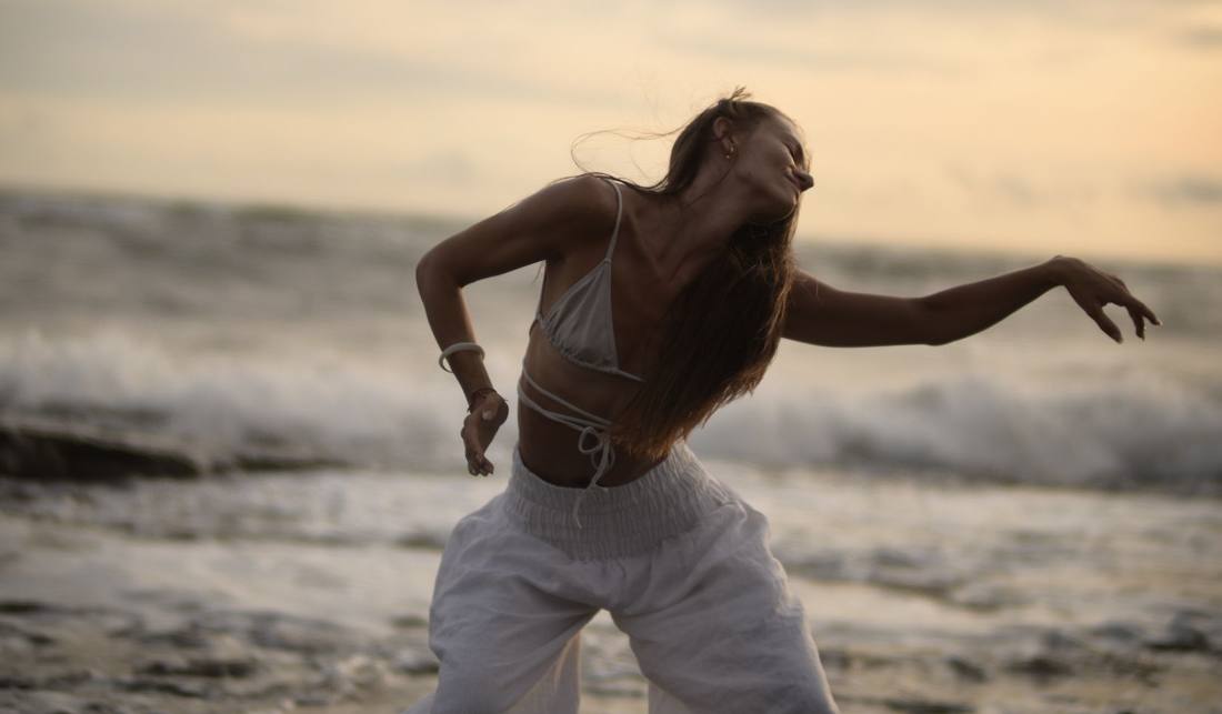 Pip dancing on the beach at dusk